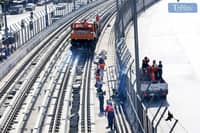 Workers are seen unloading materials for the ongoing Metro Rail Transit (MRT-7) construction project at Litex, Brgy. Commonwealth, in Quezon City, on Sunday, 10 November 2024. The 23-kilometer elevated railway line, with 14 stations from San Jose Del Monte, Bulacan, to MRT-3 North Avenue in Quezon City, is now 71.32 percent complete.