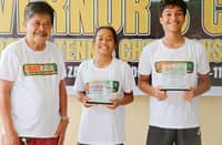 Ayl Gonzaga (center) and Pete Bandala (right) hold their trophies as they pose with Zamboanga del Sur Sports head Alfredo Cimafranca after dominating the Governor’s Cup National Juniors Tennis Championships.