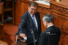 Japan PM set to form minority government