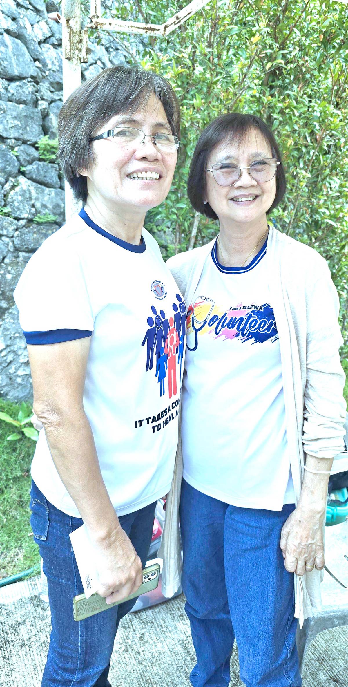 Lolita Baguio, office manager of Kapwa Ko Mahal Ko foundation and Fleoy Ysmael volunteer nurse.