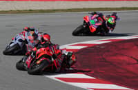 Ducati Italian rider Francesco Bagnaia rides ahead of Ducati Spanish rider Marc Marquez and Ducati Italian rider Franco Morbidelli during the Moto GP qualifying session for the Solidarity Grand Prix of Barcelona at the Circuit de Catalunya on 16 November, 2024 in Montmelo on the outskirts of Barcelona.