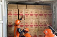 THE Department of Agriculture (DA) and the Philippine National Police inspect onions sold at Paco Market in Manila on 18 June, as the DA intensifies its crackdown on agricultural smuggling under the new Anti-Agricultural Economic Sabotage Act.