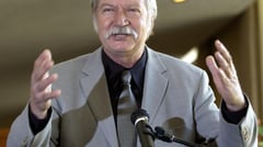 Famed gymnastics mentor dies at 82