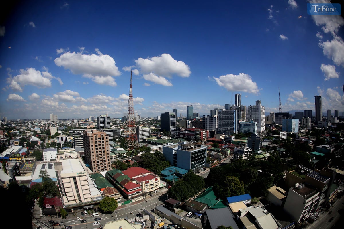 The Quezon City skyline glistens under clear skies on Wednesday, 20 November 2024, as PAGASA declares the arrival of the Northeast Monsoon (Amihan). With its cool and crisp air, Filipinos can look forward to cooler mornings and hopefully-refreshing weather in the months ahead.