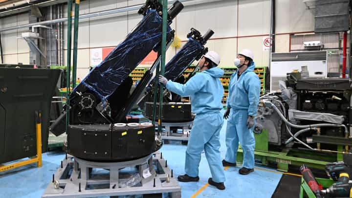South Korean engineers work on a 120mm self-propelled mortar at Hanwha Aerospace factory in Changwon on 21 November 2024. Longstanding domestic policy bars Seoul from providing weapons into active conflict zones, but ever since its spy agency accused the nuclear-armed North last month of sending thousands of soldiers to help Moscow fight Kyiv, South Korea has warned it might change course.