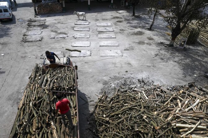 Indian man awakes on funeral pyre