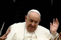 Pope Francis acknowledges the pilgrims as he arrives to lead an audience to Italian fishermen and participants to the National health services in Europe congress, promoted by Cei (Italian episcopal Conference), at Paul VI hall in the Vatican on 23 November, 2024.