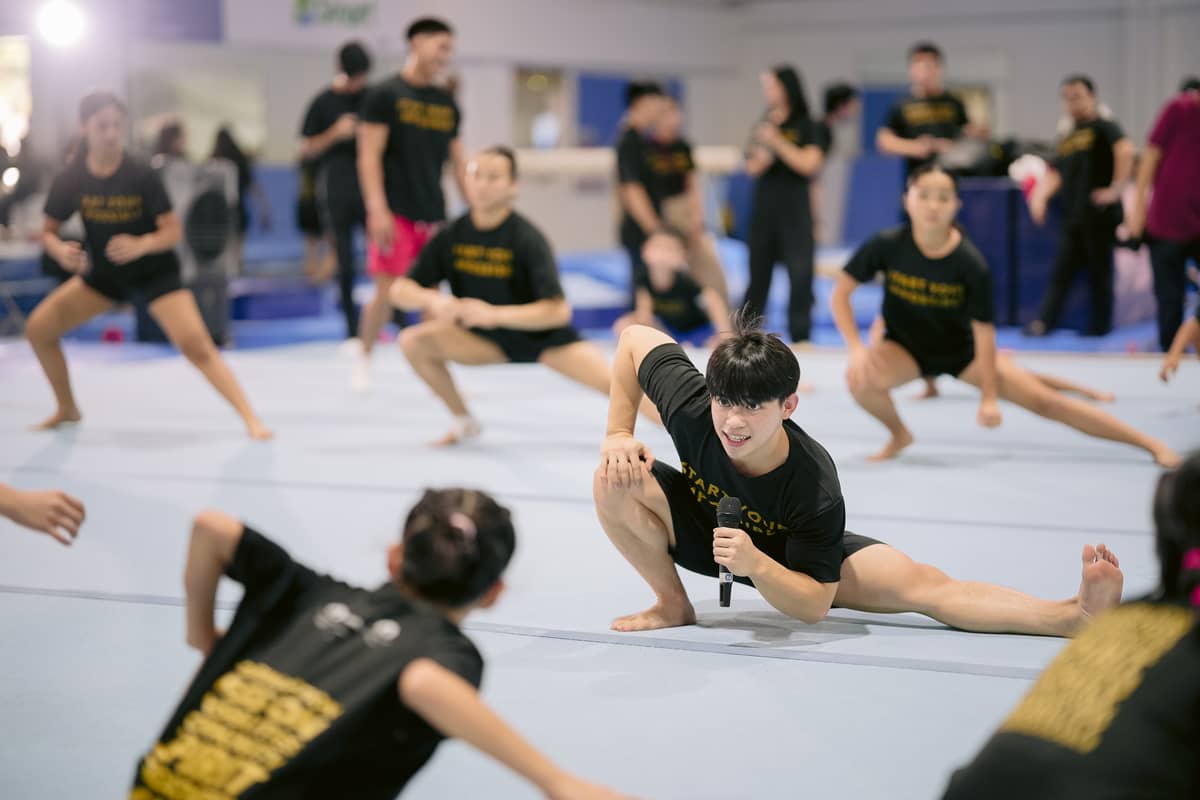 Throughout the Gymnastics Camp, the day always began with stretching and warm-up exercises.