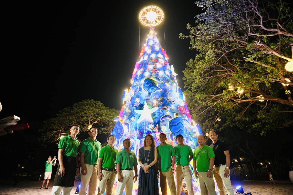 The CRAFTmas Team of Pico de Loro Cove, the team behind this year's decoratives, with Elizabeth Sy (middle).