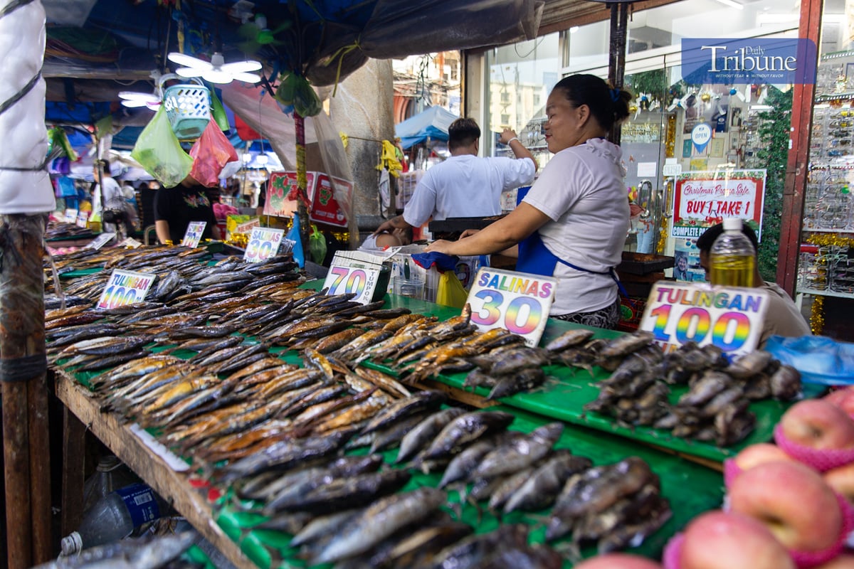 Quiapo's streets are teeming with vendors selling dried seafood, fruits, and vegetables in Manila as the Christmas nears, Tuesday, 26 November 2024.