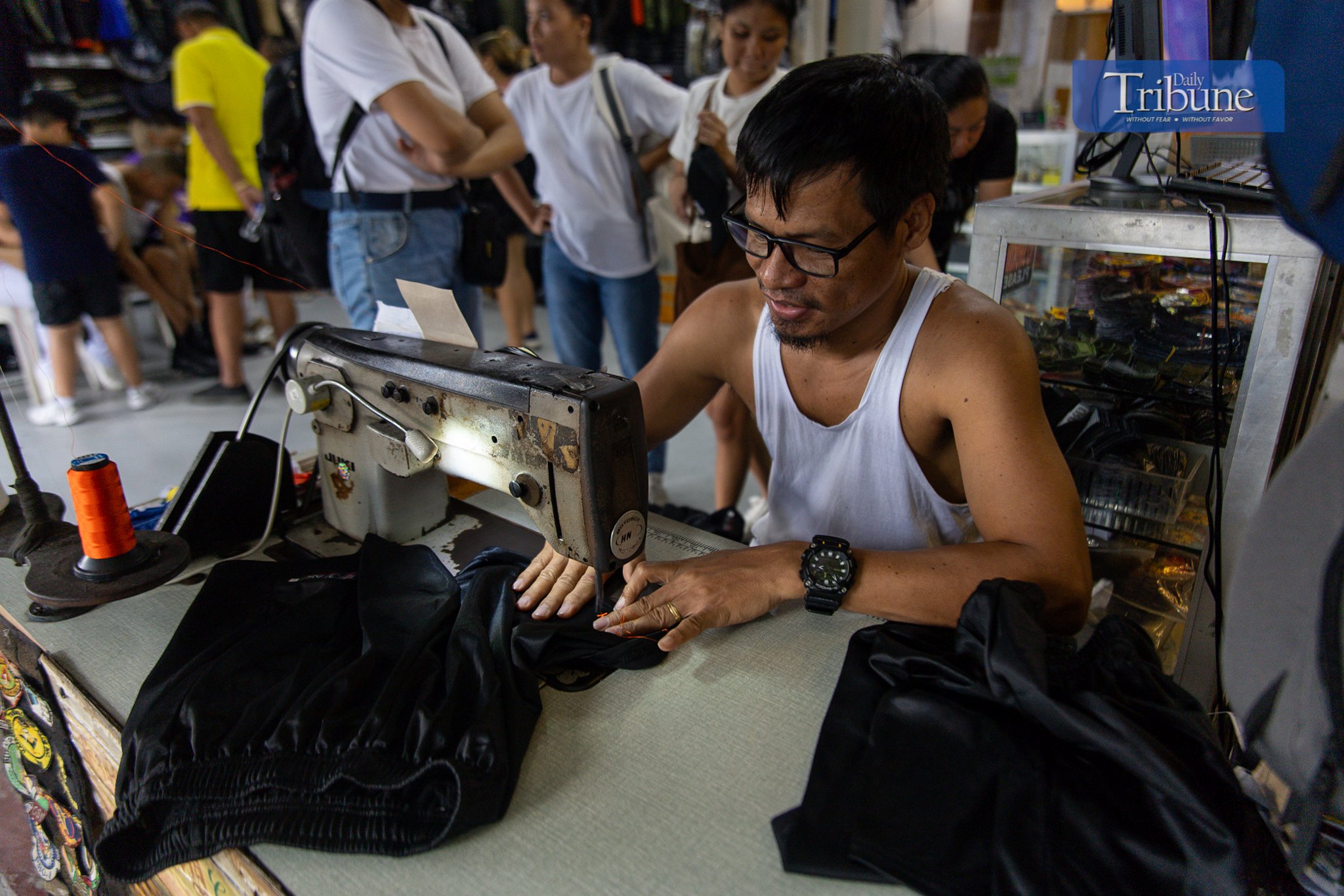 Quiapo tailor hustles for family, children's education