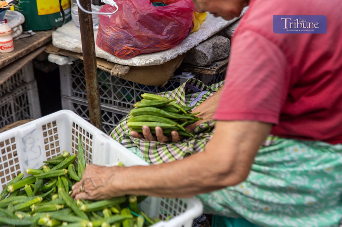 Quiapo's streets are teeming with vendors selling dried seafood, fruits, and vegetables in Manila as the Christmas nears, Tuesday, 26 November 2024.