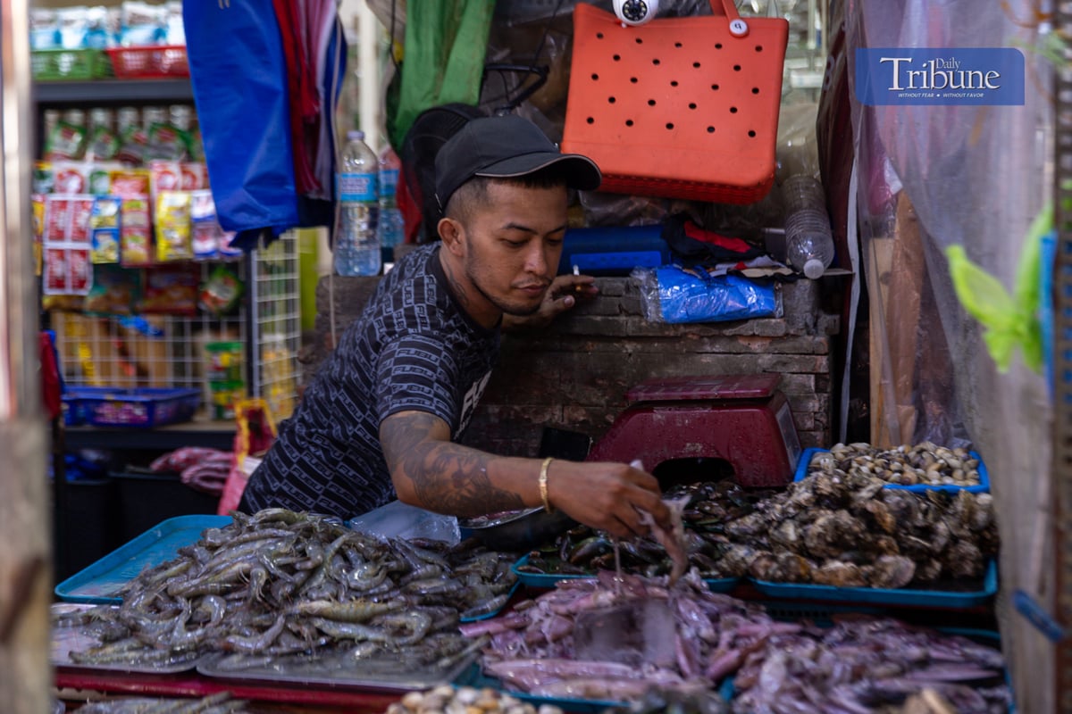 Quiapo's streets are teeming with vendors selling dried seafood, fruits, and vegetables in Manila as the Christmas nears, Tuesday, 26 November 2024.