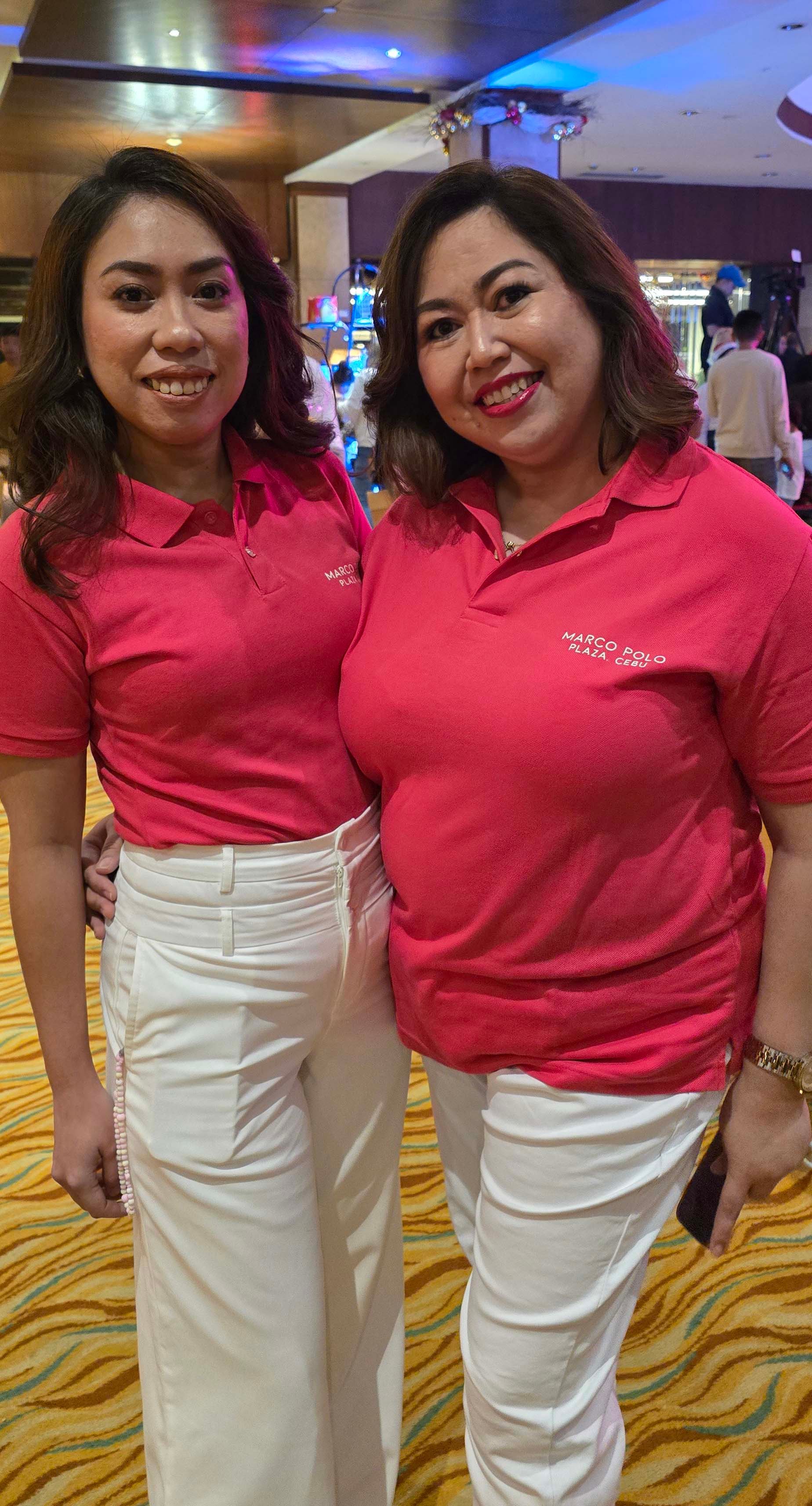 Marco Polo Plaza Hotel’s Precious Labapies, banquet sales executive and Emma Maboloc, director of catering and banquet events.