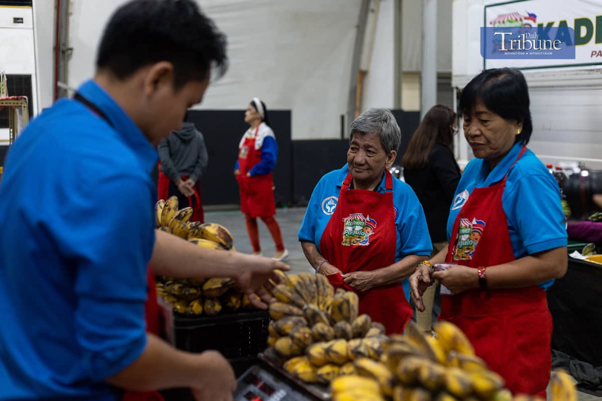 Consumers shop at the Kadiwa ng Pangulo at the Philippine International Convention Center in Pasay City, where goods are priced below market rates.