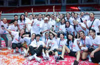 Quezon Gov. Helen Tan (middle) lifts the trophy after the Tangerines completed a sweep of Biñan in the 2024 Maharlika Pilipinas Volleyball Association best-of-three finals series late Wednesday at the Quezon Convention Center.
