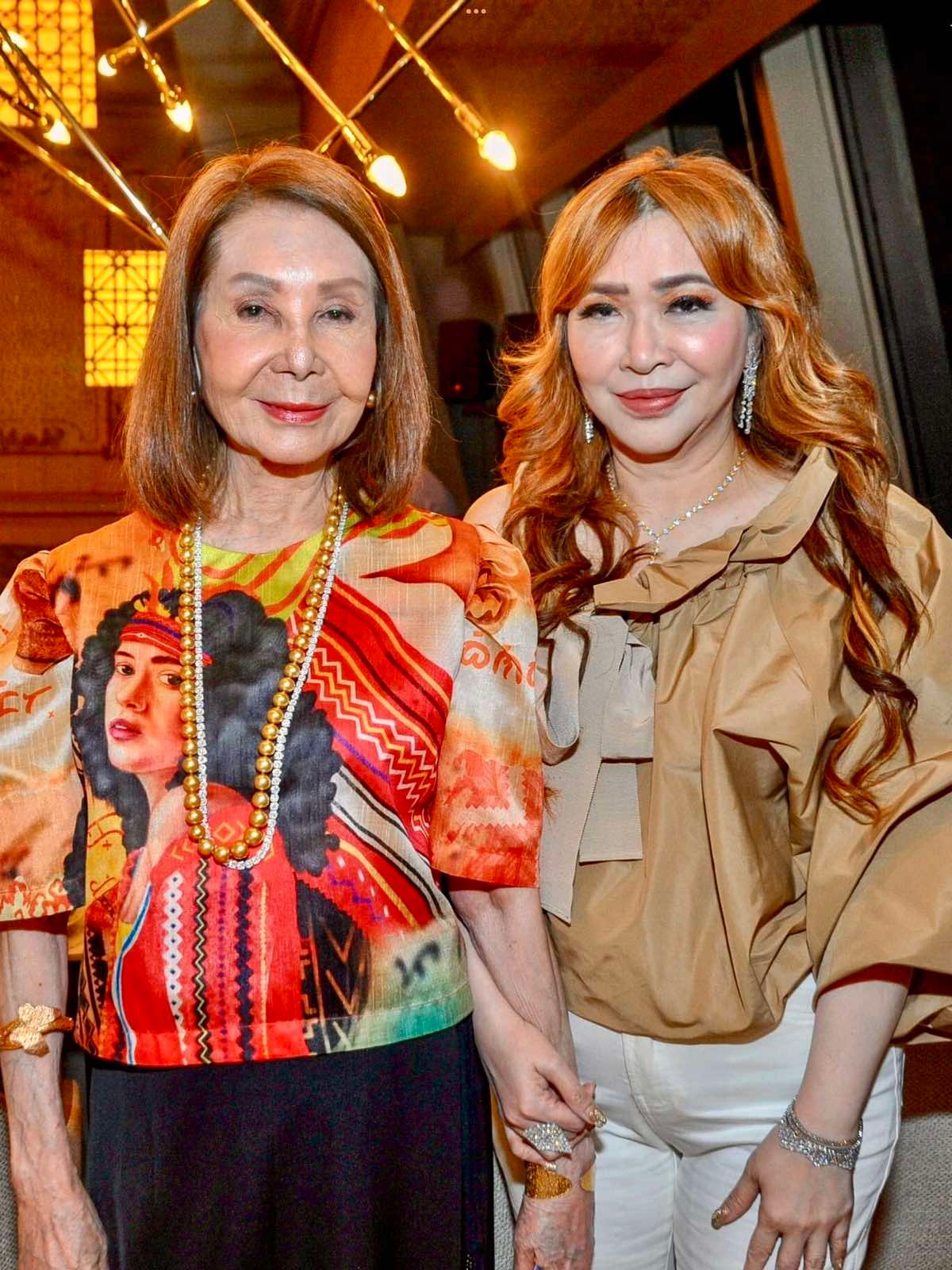 Angola Consul Helen Ong and Ruby Chua.