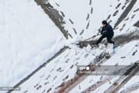 LOOK: A worker clears snow in Seoul on 28 November 2024, as heavy snowfall blanketed South Korea for a second consecutive day, resulting in three deaths overall and disrupting flights and ferry services, authorities said.