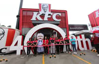 Officials of KFC Philippines unveil its 400th store and 100th branch that has drive-thru service on Friday, situated on Highway 2000, Taytay, Rizal.