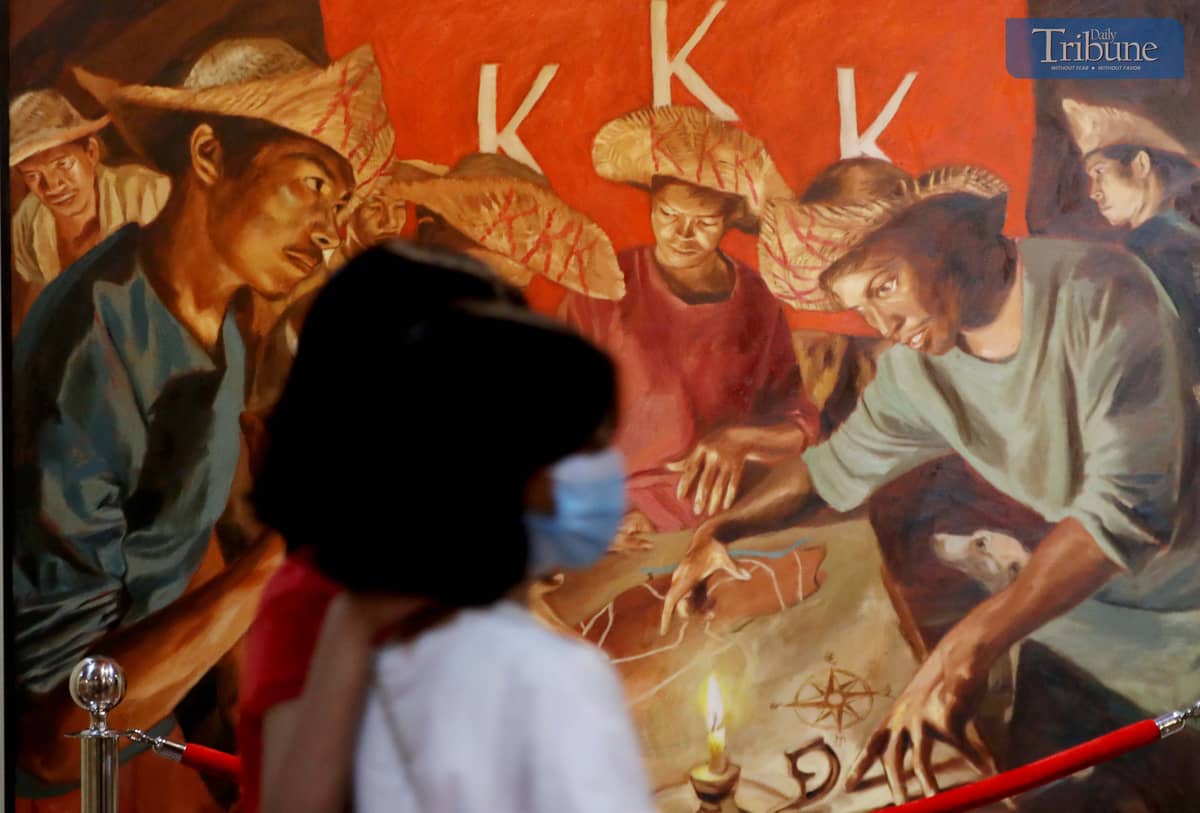 Parents bring their children to the Museo ng Katipunan in San Juan City on Saturday, 30 November.