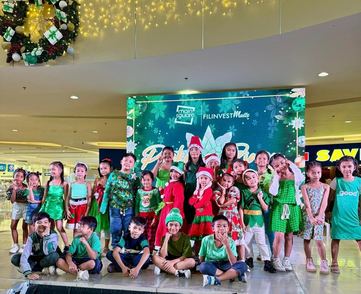 Children enjoy the holiday treats at Main Square, spreading festive joy and cheer
