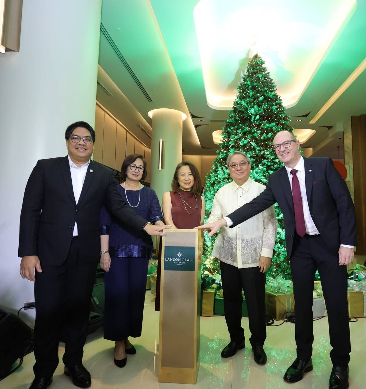 Atty. Peter Pardo, Peggy Angeles EVP SM Hotels & Conventions Corp., SMHCC president Elizabeth Sy, Congressman Antonino Calixto, and Nils Rothbarth, general manager of Lanson Place MOA.