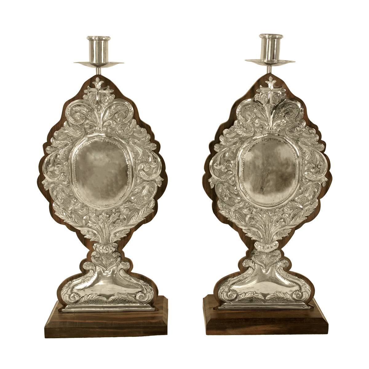 ‘A pair of Rococo silver ramilletes with center cartouche,’ c. mid-19th century, estimated P200,000 to P260,000.