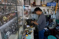 Watch and key repairman finds happiness in his craft