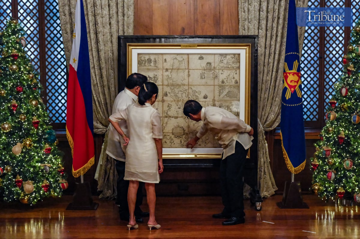 President Marcos Officially Receives Historic Murillo Velarde 1734 Map
President Ferdinand R. Marcos Jr. formally accepted the original Murillo Velarde 1734 Map during its presentation at Malacañan Palace on Friday, December 6, 2024. Often referred to as the “mother of all Philippine maps,” this landmark piece was crafted in 1734 by Filipino cartographer Francisco Suarez and engraved by Nicolas de la Cruz Bagay, under the guidance of Spanish Jesuit Father Pedro Murillo Velarde.

The map holds immense historical significance, as it was cited in the 2016 ruling by the Permanent Court of Arbitration (PCA) in The Hague. This landmark decision rejected China's expansive claims over the West Philippine Sea and affirmed the Philippines’ sovereign rights over disputed areas.

Filipino technology entrepreneur Mel Velarde acquired the map in a London auction in 2014 and later donated it to the Philippine Government as a tribute to the nation’s heritage. Officially titled Carta Hydrographica y Chorographica de las Yslas Filipinas, the Murillo Velarde 1734 Map remains a powerful symbol of the country’s rich history and its enduring assertion of territorial sovereignty.

Present during the ceremony are First Lady Liza Araneta-Marcos, former associate justice Antonio Carpio of the Supreme Court, members of the diplomatic corps, among others. 

PHOTOS BY YUMMIE DINGDING  / PPA POOL