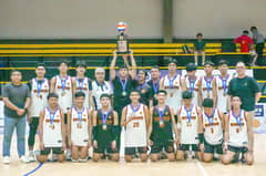 Members of the victorious University of Batangas pose with UCAL officials led by Horacio Lim, Bernard Yang and Carmelo Navarro after winning the league’s men’s volleyball crown on Friday.