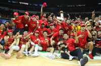 The Mapua Cardinals celebrate their first NCAA title in 33 years after sweeping the Saint Benilde Blazers on Saturday at the Smart Araneta Coliseum.