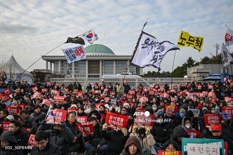 K-pop, carols, guillotines at South Korea impeachment protests