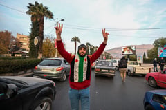 Syrian PM says ready to cooperate with any leadership after Assad flees