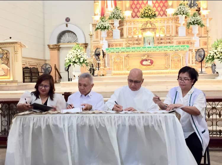 Signing of papers for the turnover.