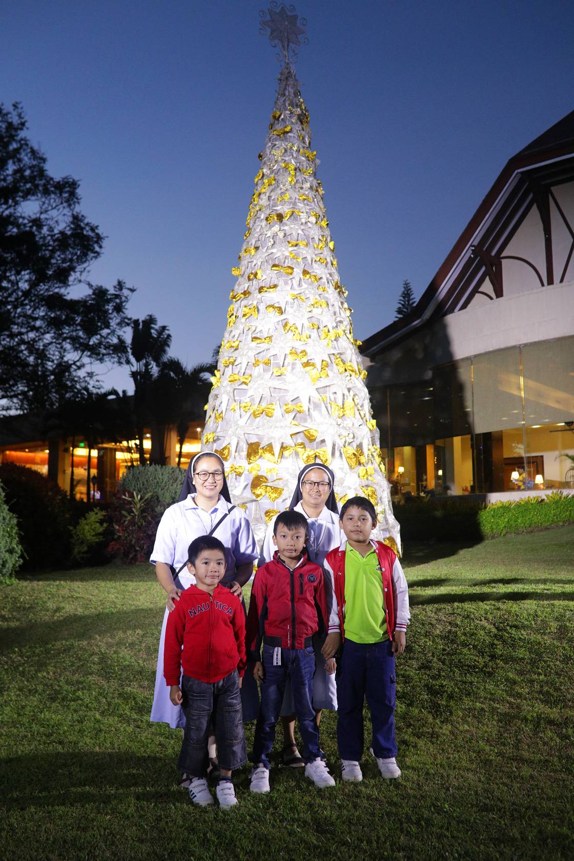 Children and nuns from the Augustinian Sisters of Joseph and Mary Orphanage.