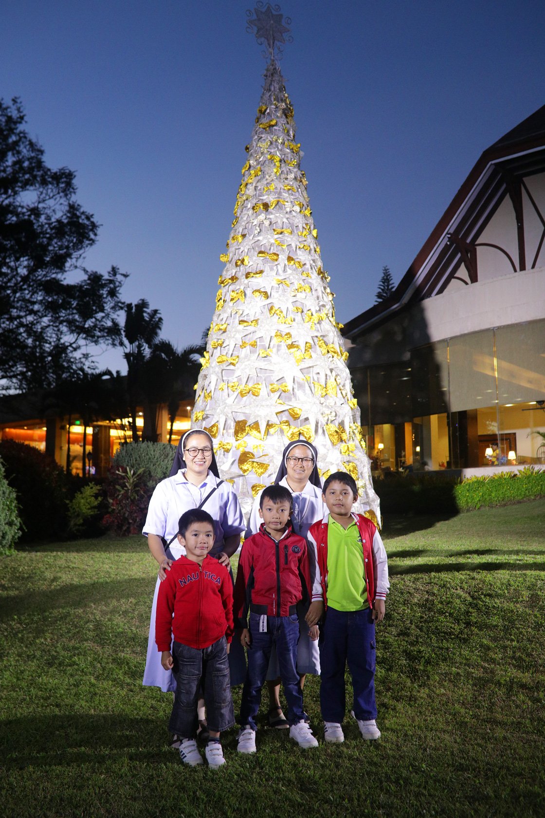 Children and nuns from the Augustinian Sisters of Joseph and Mary Orphanage.