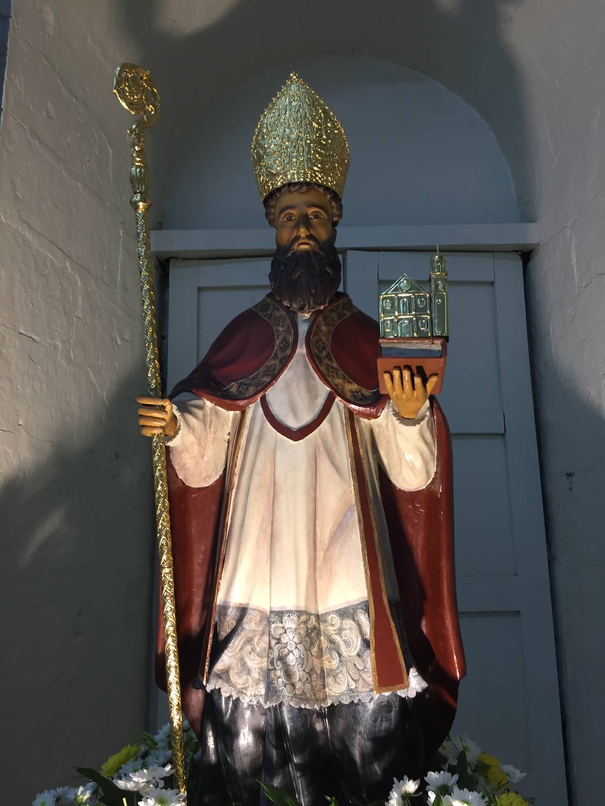 Restored old wooden image of Saint Augustine of Hippo.