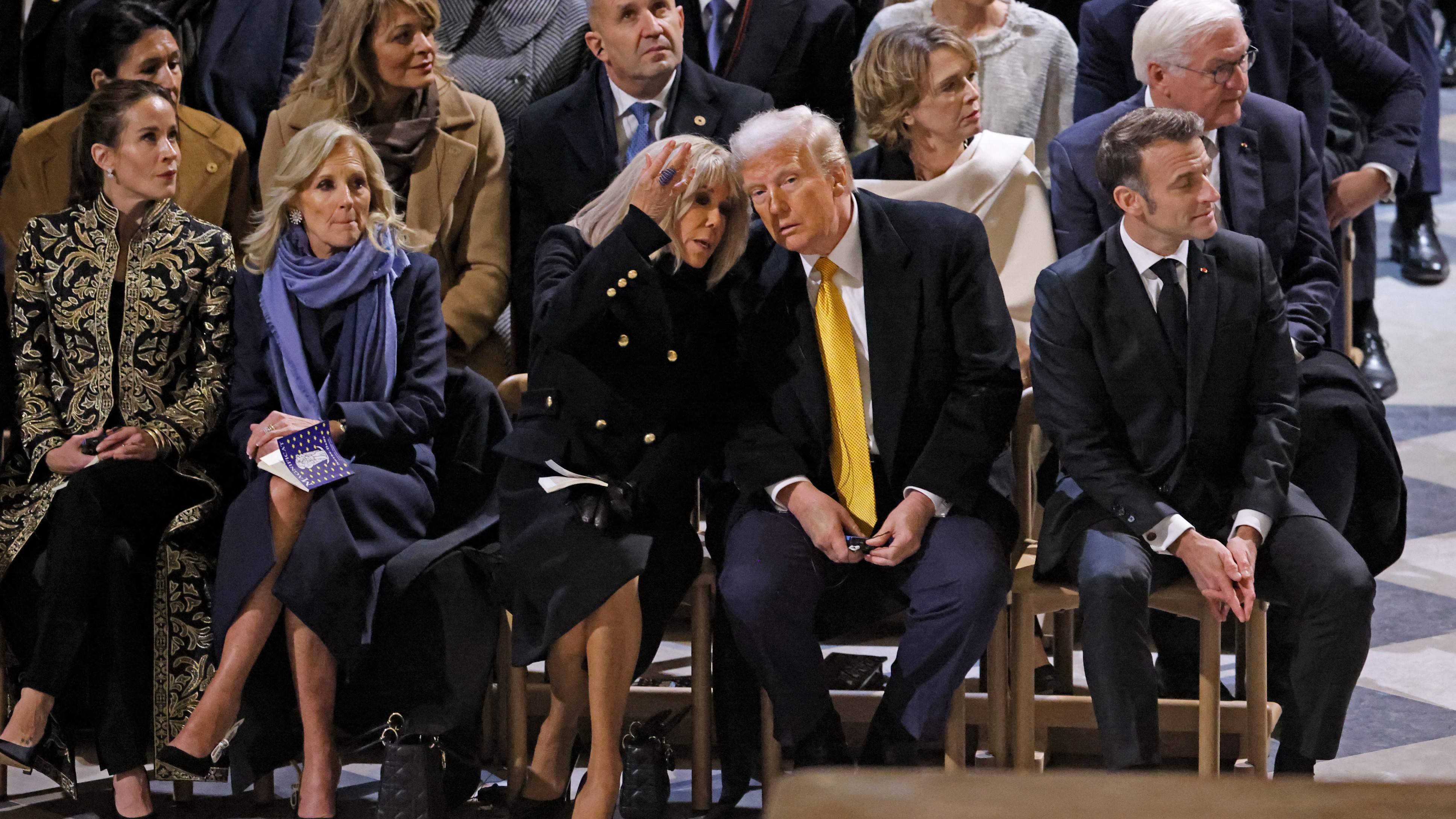French first lady helps keep Trump, Bidens apart at Notre Dame