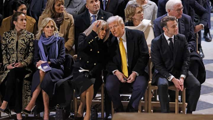President Emmanuel Macron's wife Brigitte Macron (CL) talks with US President-elect Donald Trump (CR) as they sit alongside daughter of US President Joe Biden, Ashley Biden (L), First Lady of the United States Jill Biden (2L), and French President Emmanuel Macron (R) inside Notre-Dame Cathedral ahead of a ceremony to mark the re-opening of the landmark cathedral, in central Paris, on 7 December 2024. Around 50 heads of state and government are expected in the French capital to attend the ceremony marking the rebuilding of the Gothic masterpiece five years after the 2019 fire which ravaged the world heritage landmark and toppled its spire. Some 250 companies and hundreds of experts were part of the five-year restoration project at a cost of hundreds of millions of euros.