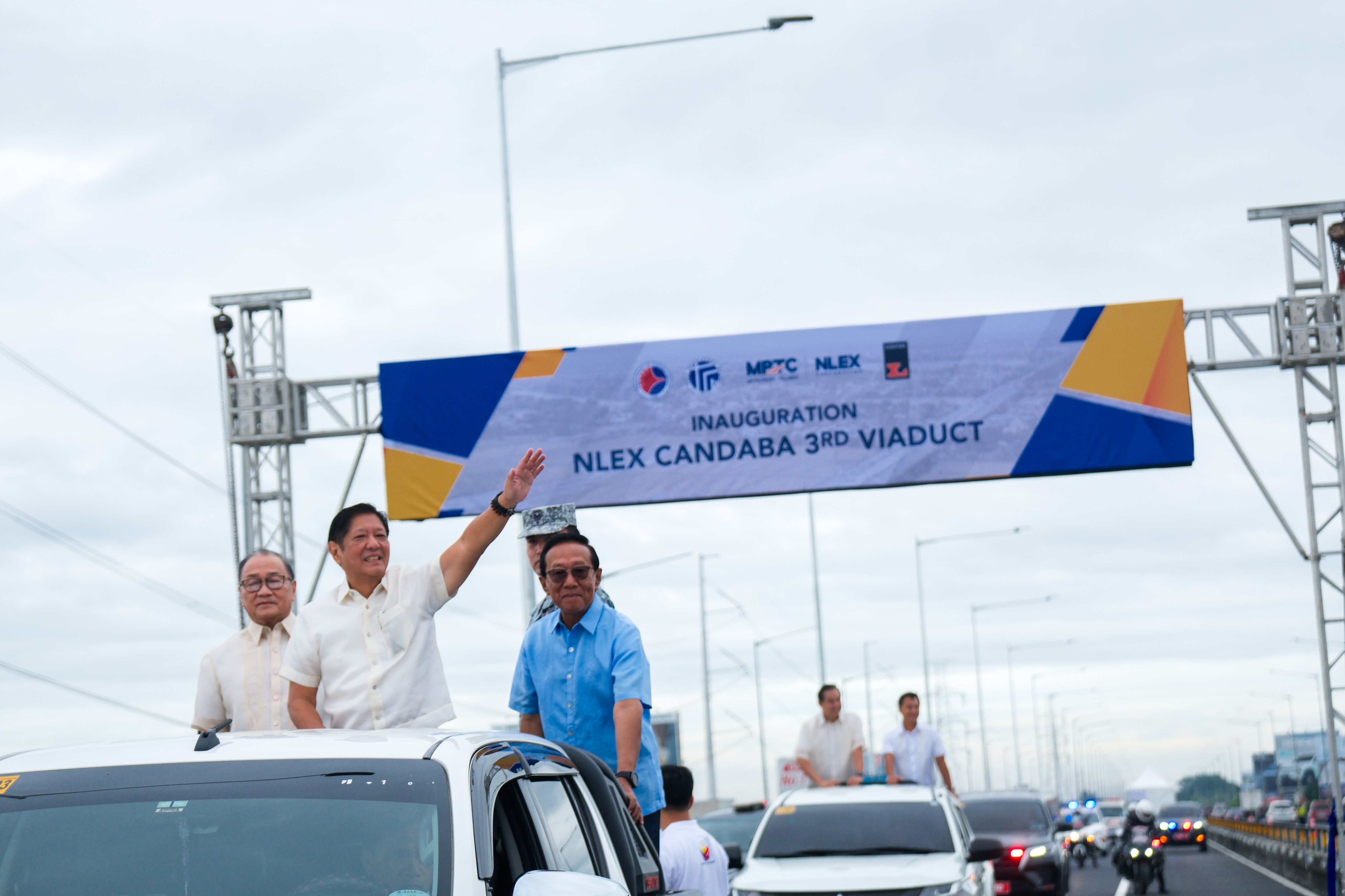 President Ferdinand R. Marcos Jr. leads the inauguration of the NLEX Candaba 3rd Viaduct on 10 December 2024 in Apalit, Pampanga. An essential part of the NLEX network, the 5-kilometer-long Viaduct is a vital link between Metro Manila, and Central and Northern Luzon. With the President are Department of Public Works and Highways Secretary Manuel Bonoan (right), and Manuel Pangilinan, chairman of Metro Pacific Investments Corporation and chairman and CEO of Manila North Tollways Corp.