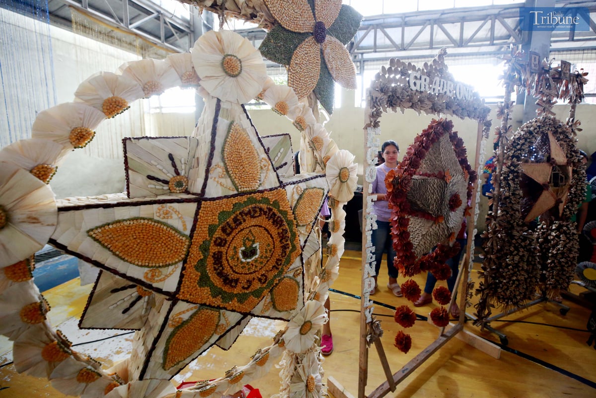 Teachers and students at Payatas B Elementary School in Quezon City craft parols from recycled materials for their eco-friendly Christmas celebration on Tuesday, 10 December 2024.