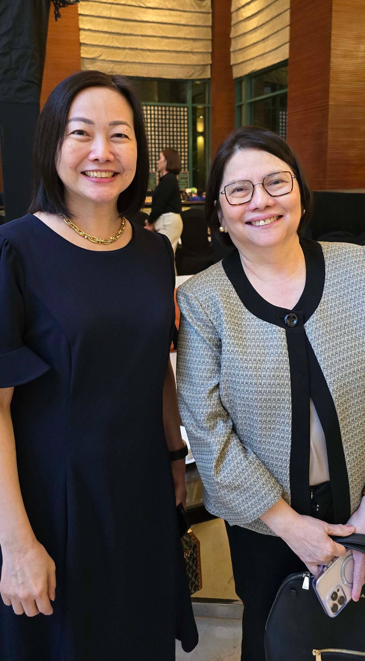 Candice Gotianuy, University of Cebu Chancellor and Marissa Fernan, vice president of SM Prime Holdings-Vismin.