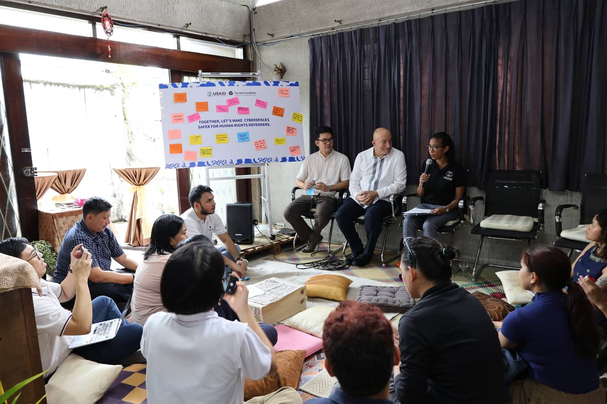 Right: USAID Acting Mission Director Eubanks (seated right) speaks to representatives of human rights organizations about USAID’s commitment to supporting their cybersecurity resilience. She is joined by (seated from left) Initiative for Advancing Community Transformation (I-ACT) Chief of Party Atty. Paolo "Paco" Camacho and The Asia Foundation Country Representative Sam Chittick.