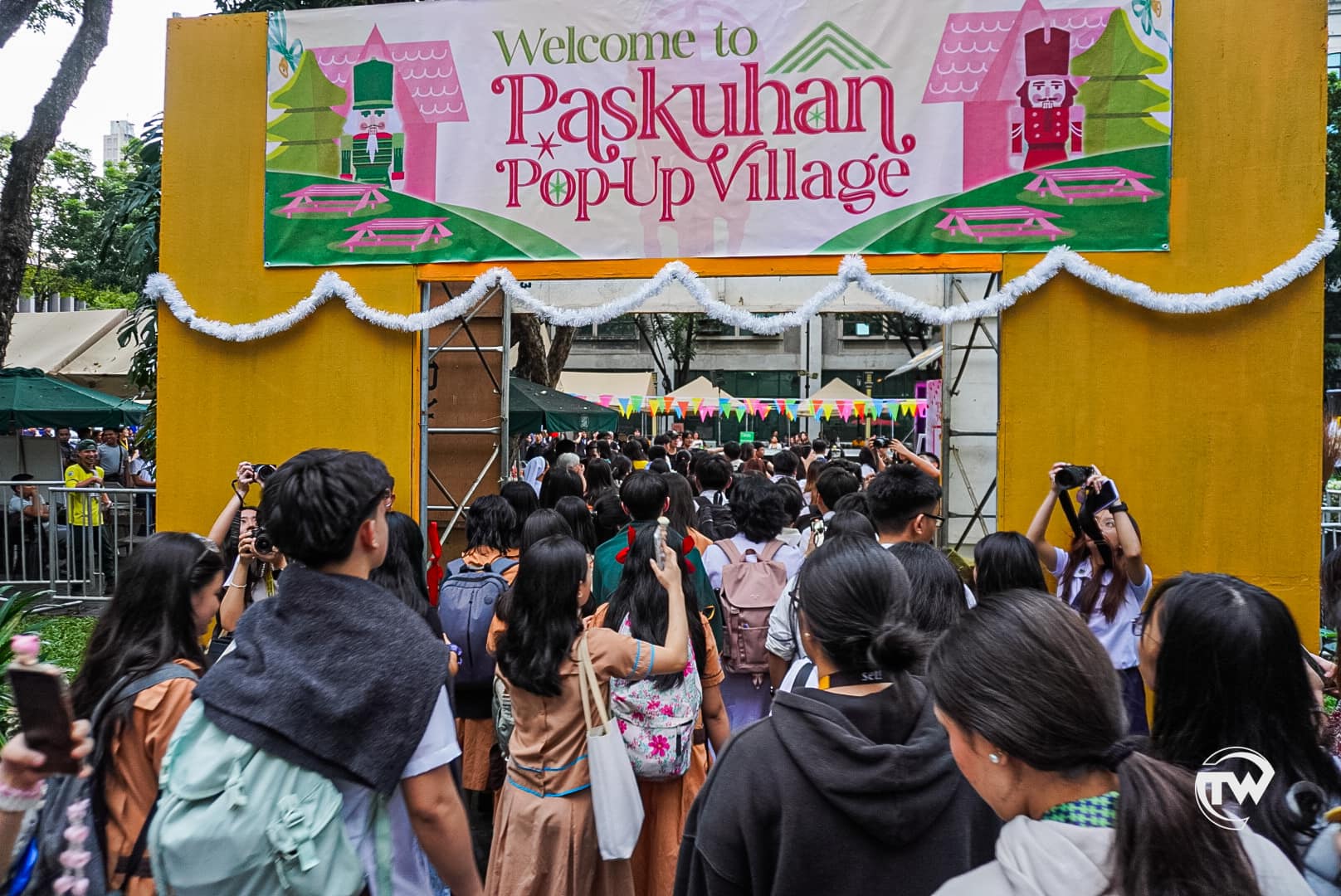 The UST Paskuhan Pop Up Village welcoming students to the bazaar.