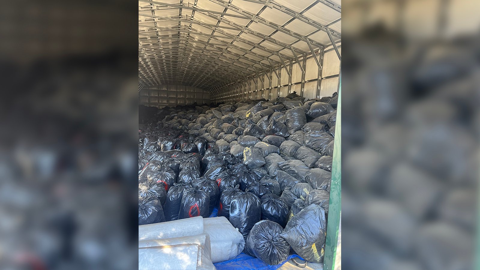 TRASH bags containing over 41,000 kilos of Marijuana valued at $100 million recovered during a search warrant by San Bernardino County Sheriff’s Department Marijuana Enforcement Team on 9 December 2024 in Oak Hills, California.