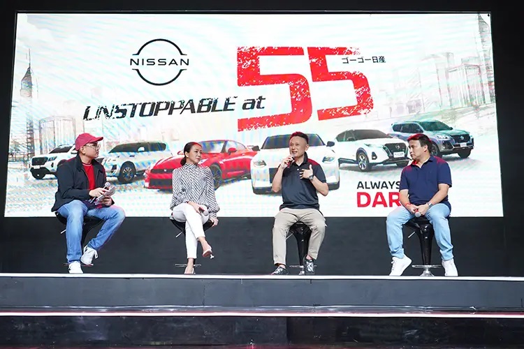Nissan Philippines president Yasuhisa Masuda (second from right) reflects on the company’s journey to become one of the most trusted car manufacturers in the country. Also shown are event host Gio Kawachi (left) and panelists Raena Abella (second to the left) and Dexter Lim.