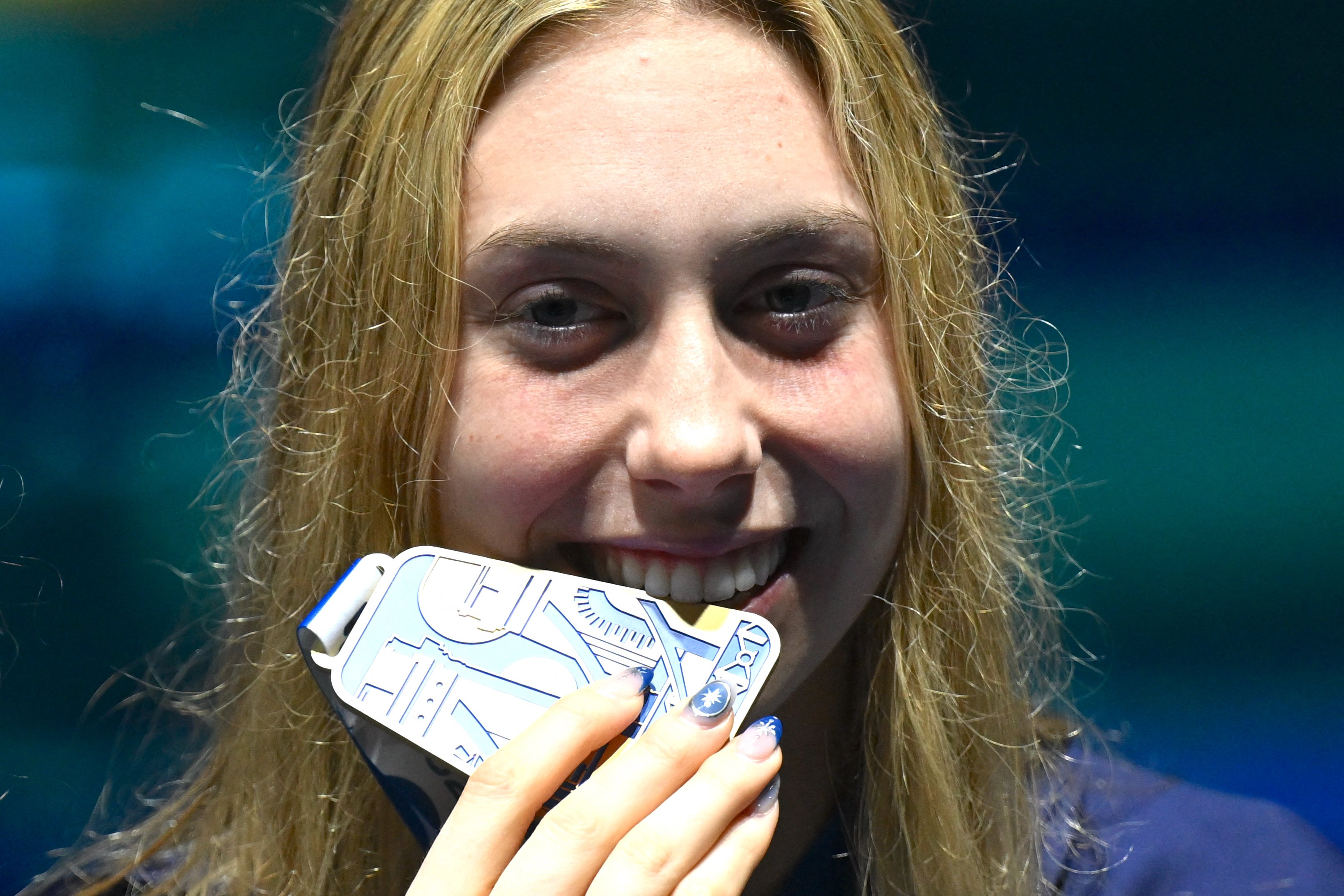 AMERICAN EXPRESS: Walsh leads U.S. dominance in world swim meet