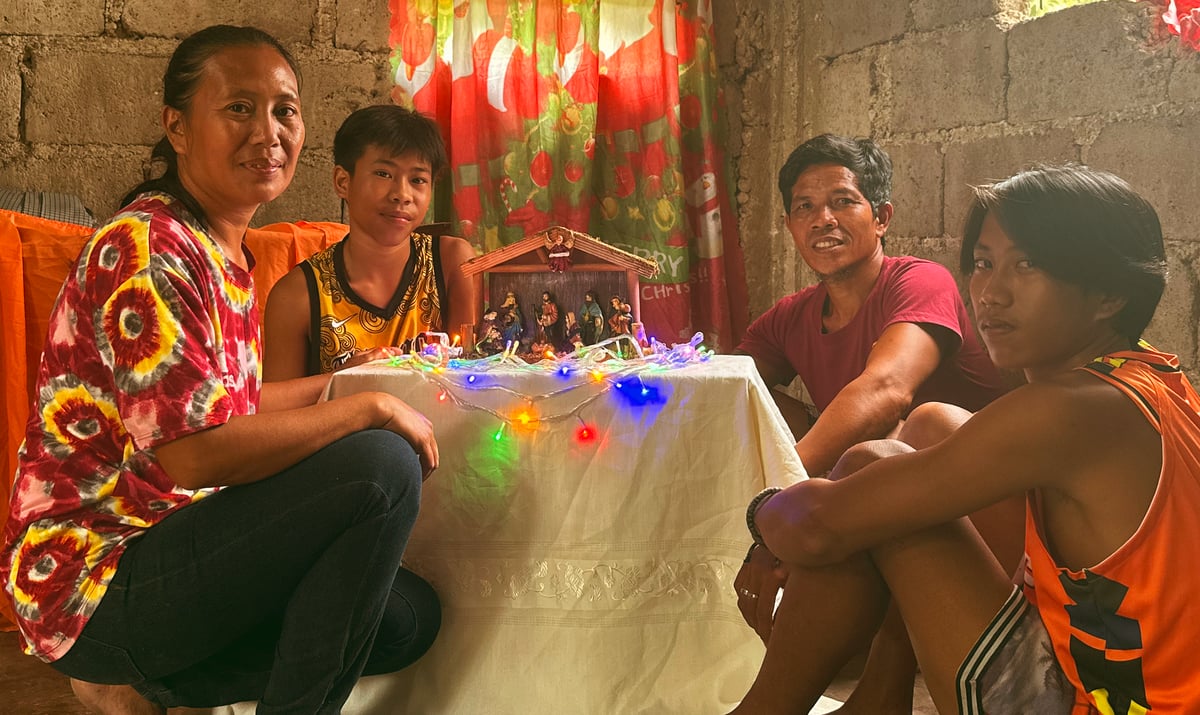 The Belen of Analou’s family is brightened up by colorful Christmas lights.