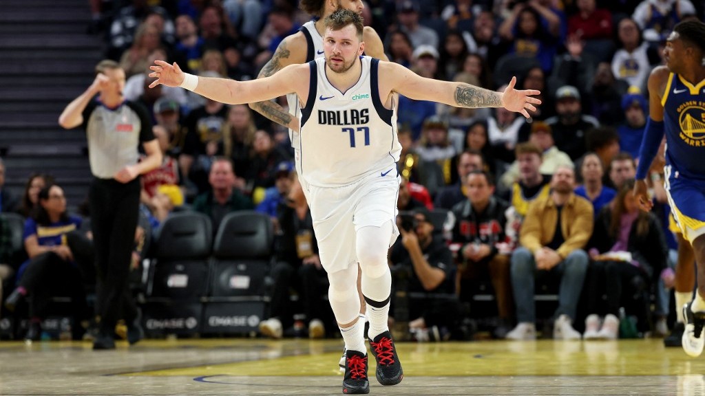 Doncic triple-double leads Mavs over Warriors in record duel