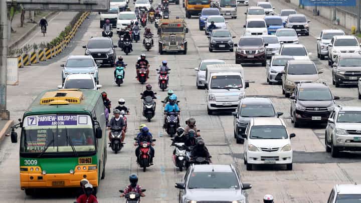 (December 17, 2024) On Tuesday, December 17, 2024, motorcycle taxis were seen plying Commonwealth Avenue in Quezon City. The Land Transportation Franchising and Regulatory Board (LTFRB) has issued a show cause order (SCO) to two of the three ride-hailing companies operating in the national capital for allegedly exceeding the government's limit on the number of motorcycle taxi riders. Photo/Analy Labor